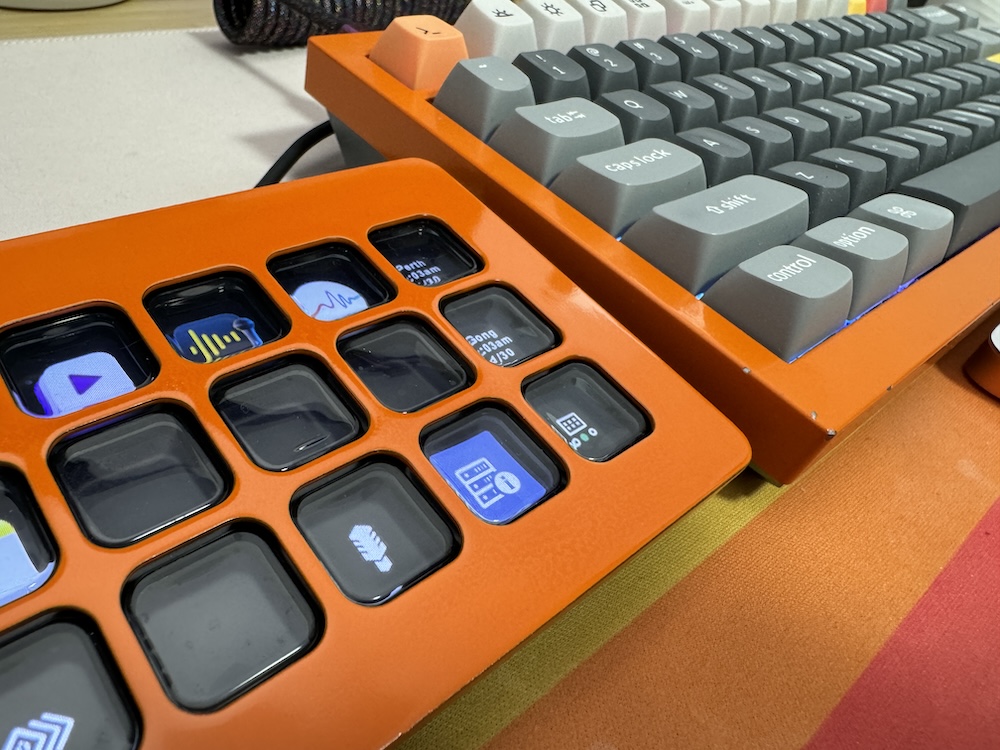 Bright orange Stream Deck next to bright orange keyboard